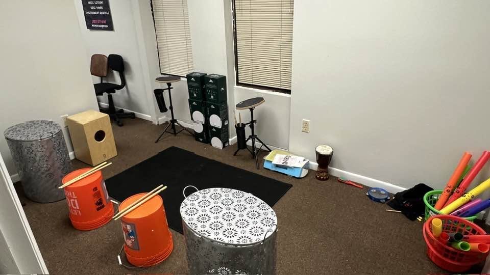 The percussion room, with bucket drums and djembe