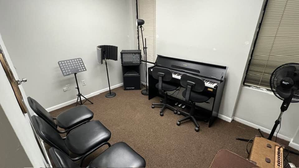 A private lesson room with piano